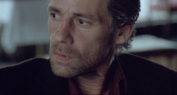 Movie still from “Head-On” (2004), directed by Fatih Akin – A person with a beard; Close Up shot, Low angle