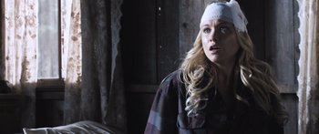 Movie still from “Tucker and Dale vs Evil” (2010), directed by Eli Craig – A woman with a bandage on her head; Close Up shot, Over the shoulder angle