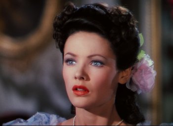 Movie still from “Heaven Can Wait” (1943), directed by Ernst Lubitsch – A person wearing a dress; Close Up shot, High angle