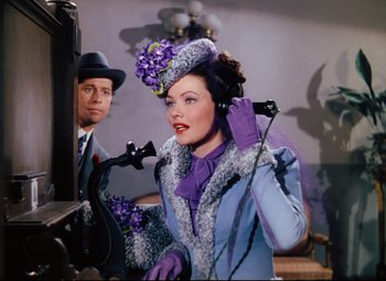 Movie still from “Heaven Can Wait” (1943), directed by Ernst Lubitsch – A man and a woman dressed up in costume; Medium shot, Low angle