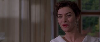 Movie still from “Heavenly Creatures” (1994), directed by Peter Jackson – A person with short brown hair; Close Up shot, Over the shoulder angle