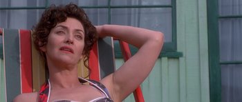 Movie still from “Heavenly Creatures” (1994), directed by Peter Jackson – A person sitting in a chair; Close Up shot, Low angle
