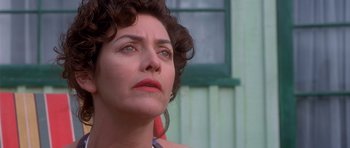 Movie still from “Heavenly Creatures” (1994), directed by Peter Jackson – A person looking up at the sky; Close Up shot, Low angle