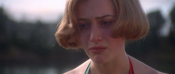 Movie still from “Heavenly Creatures” (1994), directed by Peter Jackson – A person with short brown hair; Close Up shot, Low angle