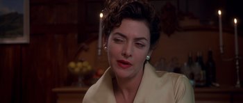 Movie still from “Heavenly Creatures” (1994), directed by Peter Jackson – A person wearing a jacket; Close Up shot, Over the shoulder angle