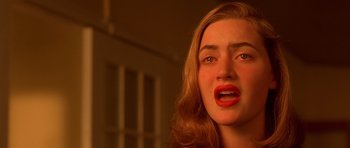Movie still from “Heavenly Creatures” (1994), directed by Peter Jackson – A person with a mouth open; Close Up shot, Low angle