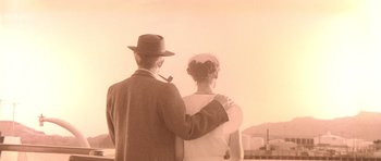 Movie still from “Heavenly Creatures” (1994), directed by Peter Jackson – An older man and a woman standing next to each other; Extreme Close Up shot, High angle