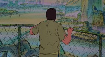 Movie still from “Heavy Metal” (1981), directed by Gerald Potterton – A man looking out over a city from a fence; Medium shot, Low angle