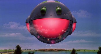 Movie still from “Heavy Metal” (1981), directed by Gerald Potterton – An image of an alien flying in the sky; Extreme Wide shot, Low angle