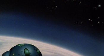 Movie still from “Heavy Metal” (1981), directed by Gerald Potterton – A view of the earth from a space station; Extreme Wide shot, Low angle