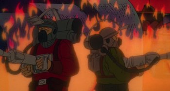 Movie still from “Heavy Metal” (1981), directed by Gerald Potterton – Two cartoon characters are standing in front of a fire; Medium shot, Low angle