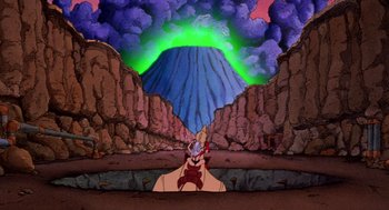 Movie still from “Heavy Metal” (1981), directed by Gerald Potterton – An animated scene of a mountain with a green light in the background; Extreme Wide shot, High angle