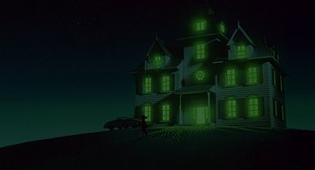 Movie still from “Heavy Metal” (1981), directed by Gerald Potterton – A car parked in front of a lit up house at night; Extreme Wide shot, Low angle