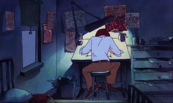 Movie still from “Heavy Traffic” (1973), directed by Ralph Bakshi – A man sitting at a desk in front of a computer screen; Wide shot, High angle