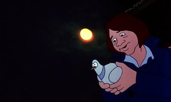 Movie still from “Heavy Traffic” (1973), directed by Ralph Bakshi – A woman holding a bird in front of the moon; Close Up shot, Low angle