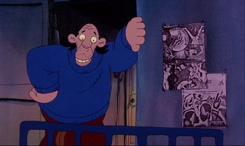 Movie still from “Heavy Traffic” (1973), directed by Ralph Bakshi – An animated picture of a man in a blue shirt; Medium shot, Overhead angle