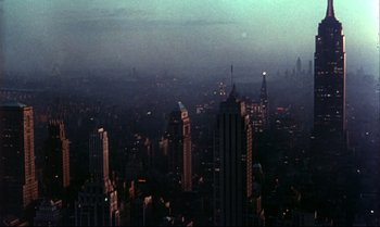 Movie still from “Heavy Traffic” (1973), directed by Ralph Bakshi – A view of a city at night from a helicopter; Extreme Wide shot, High angle