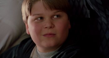 Movie still from “Heavyweights” (1995), directed by Steven Brill – A young boy's face; Close Up shot, High angle