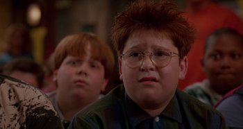 Movie still from “Heavyweights” (1995), directed by Steven Brill – Two young boys are sitting in front of each other; Close Up shot, Over the shoulder angle