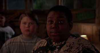 Movie still from “Heavyweights” (1995), directed by Steven Brill – Two boys are standing in front of each other; Close Up shot, High angle