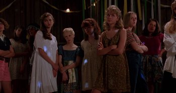Movie still from “Heavyweights” (1995), directed by Steven Brill – A group of young girls standing next to each other; Medium shot, Low angle