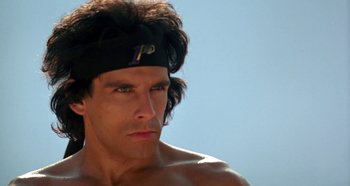 Movie still from “Heavyweights” (1995), directed by Steven Brill – A person wearing a headband; Close Up shot, Low angle
