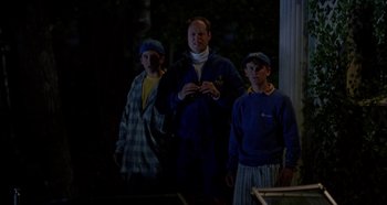 Movie still from “Heavyweights” (1995), directed by Steven Brill – A group of people standing next to each other; Medium shot, Over the shoulder angle