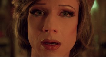 Movie still from “Hedwig and the Angry Inch” (2001), directed by John Cameron Mitchell – A woman's eyes and face; Extreme Close Up shot, Overhead angle