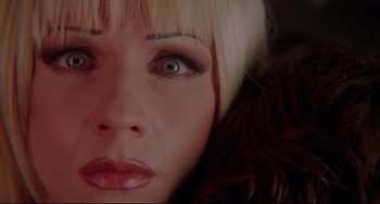 Movie still from “Hedwig and the Angry Inch” (2001), directed by John Cameron Mitchell – A woman's eyes and hair; Extreme Close Up shot, Overhead angle