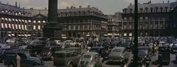 Movie still from “Hell and High Water” (1954), directed by Samuel Fuller – A bunch of cars are parked in a parking lot; Extreme Wide shot, High angle
