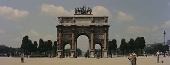 Movie still from “Hell and High Water” (1954), directed by Samuel Fuller – A group of people standing in front of an arch; Extreme Wide shot, High angle