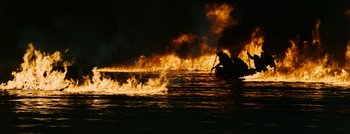Movie still from “Hell and High Water” (1954), directed by Samuel Fuller – A person on a boat in the middle of the night; Extreme Wide shot, High angle