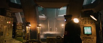 Movie still from “Hellboy” (2019), directed by Neil Marshall – A man in a nazi uniform standing in front of a building; Wide shot, Low angle