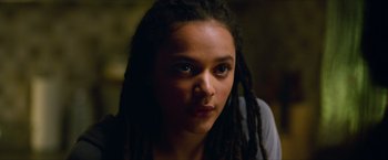 Movie still from “Hellboy” (2019), directed by Neil Marshall – A person with dreads; Close Up shot, Over the shoulder angle