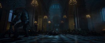 Movie still from “Hellboy” (2019), directed by Neil Marshall – A dark room with lights on the ceiling and a floor; Extreme Wide shot, High angle