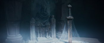 Movie still from “Hellboy” (2019), directed by Neil Marshall – An image of a statue in the middle of a room; Extreme Close Up shot, High angle