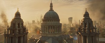 Movie still from “Hellboy” (2019), directed by Neil Marshall – An aerial view of the dome of a building in the city; Extreme Wide shot, Low angle
