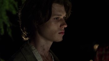 Movie still from “Hellraiser: Revelations” (2011), directed by Víctor Garcia – A person with long brown hair; Close Up shot, Low angle