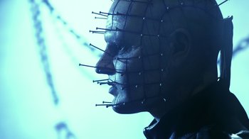 Movie still from “Hellraiser: Revelations” (2011), directed by Víctor Garcia – A person with a face covered in pins; Close Up shot, Low angle