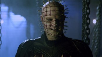 Movie still from “Hellraiser: Revelations” (2011), directed by Víctor Garcia – A person with a face covered in needles; Close Up shot, Low angle