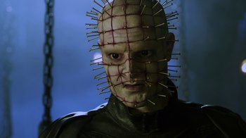 Movie still from “Hellraiser: Revelations” (2011), directed by Víctor Garcia – A person with a face made out of toothpicks; Close Up shot, Low angle