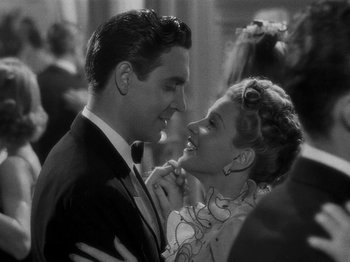 Movie still from “Hellzapoppin'” (1941), directed by H.C. Potter – A man and a woman dancing together in a room; Close Up shot, High angle