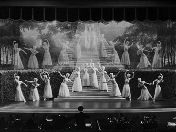 Movie still from “Hellzapoppin'” (1941), directed by H.C. Potter – A black and white photo of a scene from a musical; Extreme Wide shot, High angle