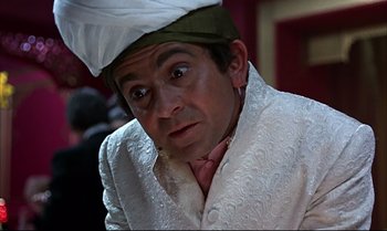 Movie still from “Help!” (1965), directed by Richard Lester – A person wearing a hat; Close Up shot, Low angle