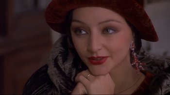 Movie still from “Henry & June” (1990), directed by Philip Kaufman – A person wearing a hat; Close Up shot, High angle