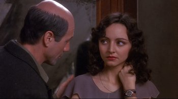 Movie still from “Henry & June” (1990), directed by Philip Kaufman – A man and a woman talking to each other; Close Up shot, Over the shoulder angle