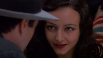 Movie still from “Henry & June” (1990), directed by Philip Kaufman – A woman's face and a man's face; Close Up shot, Over the shoulder angle