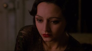 Movie still from “Henry & June” (1990), directed by Philip Kaufman – A person wearing a dress; Close Up shot, High angle