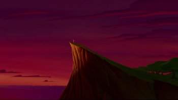 Movie still from “Hercules” (1997), directed by Ron Clements – A person standing on top of a mountain at sunset; Extreme Wide shot, Low angle