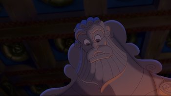 Movie still from “Hercules” (1997), directed by Ron Clements – The face of a character in a cartoon; Close Up shot, Low angle